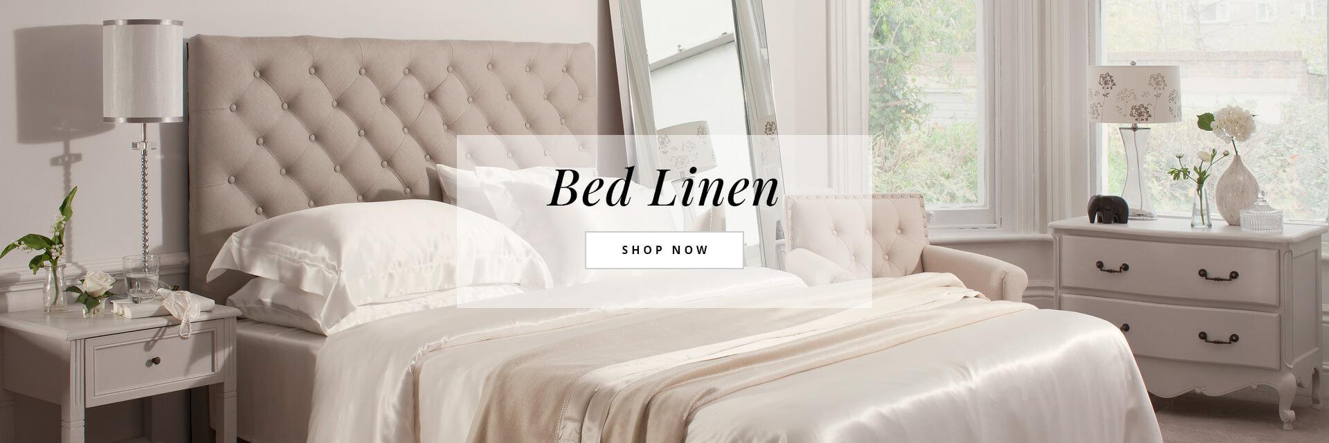 Bed with silk bed linen